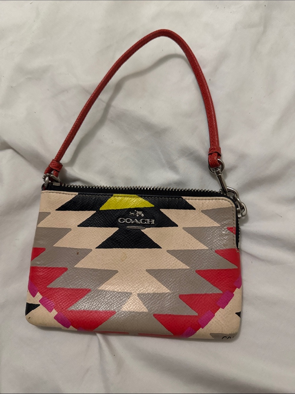 COACH Multicolor Geometric Print Wristlet with Red Handle